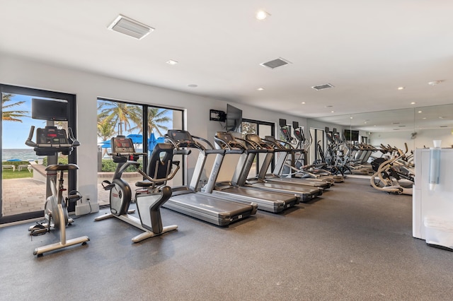 gym featuring visible vents and recessed lighting