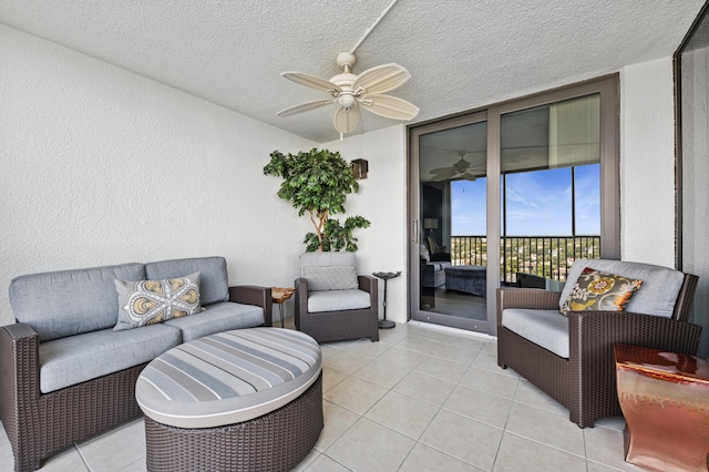 view of patio / terrace featuring ceiling fan and an outdoor living space