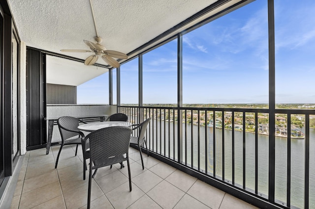 3420 S Ocean Blvd Unit 15V, Highland Beach, FL 33487 - sunroom / solarium featuring a water view, ceiling fan, and plenty of natural light
