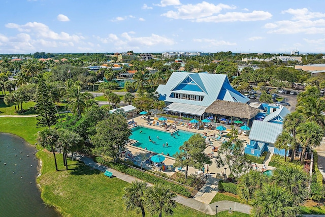 birds eye view of property with a water view