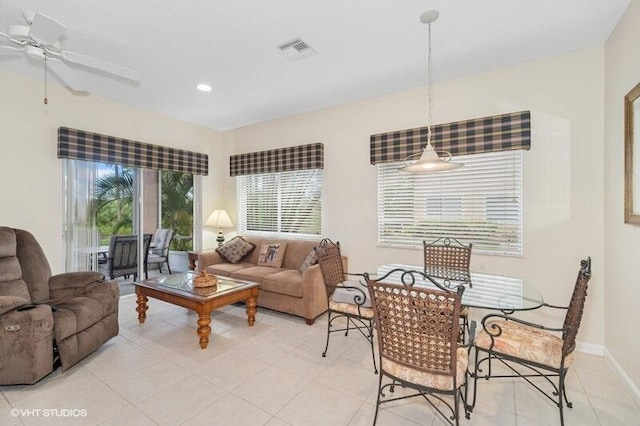 living area featuring recessed lighting, visible vents, light tile patterned flooring, ceiling fan, and baseboards