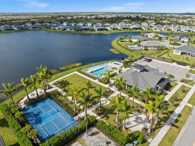 aerial view with a water view and a residential view