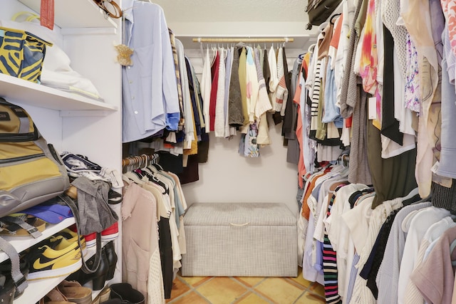 spacious closet with tile patterned flooring