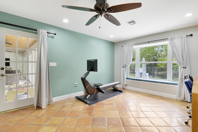 workout room featuring light tile patterned flooring, recessed lighting, a ceiling fan, visible vents, and baseboards