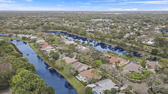 birds eye view of property featuring a water view and a residential view