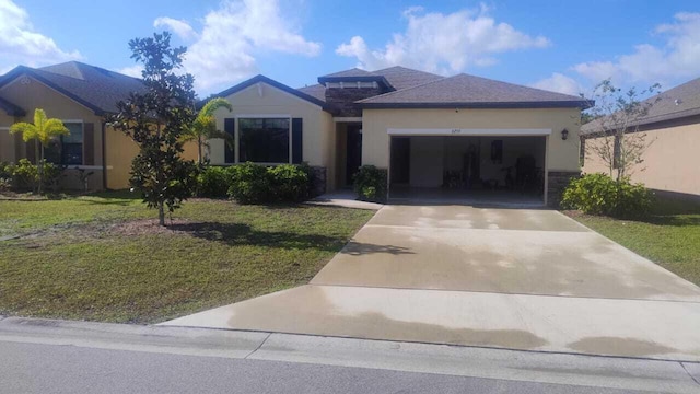 6259 NW Regent St, Port Saint Lucie, FL 34983 - ranch-style home with a garage, driveway, a front yard, and stucco siding