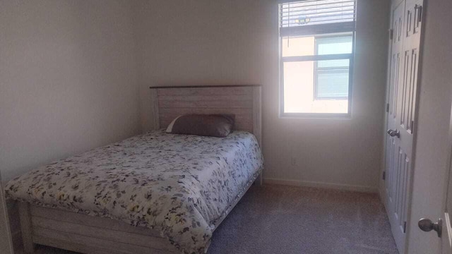 6259 NW Regent St, Port Saint Lucie, FL 34983 - carpeted bedroom with baseboards