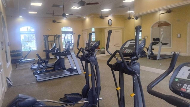 6259 NW Regent St, Port Saint Lucie, FL 34983 - exercise room featuring ceiling fan, baseboards, and carpet