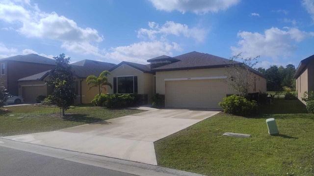 6259 NW Regent St, Port Saint Lucie, FL 34983 - single story home with concrete driveway, stucco siding, a front lawn, and a garage