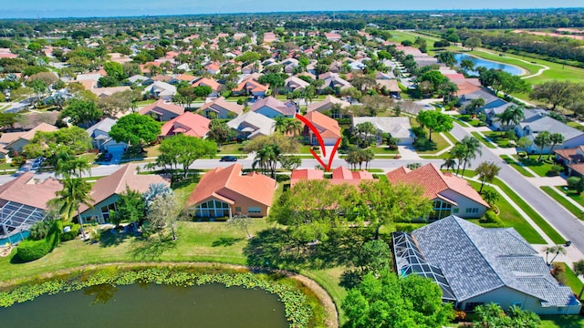 aerial view with a water view and a residential view