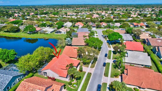 aerial view with a water view and a residential view