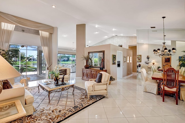 living area featuring an inviting chandelier, recessed lighting, vaulted ceiling, and light tile patterned flooring