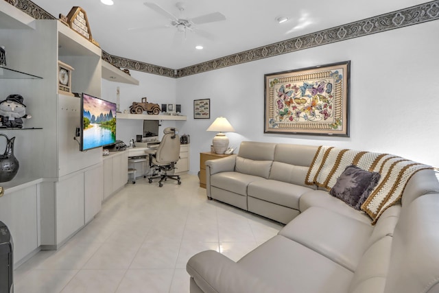 living area with built in study area, light tile patterned flooring, recessed lighting, and ceiling fan