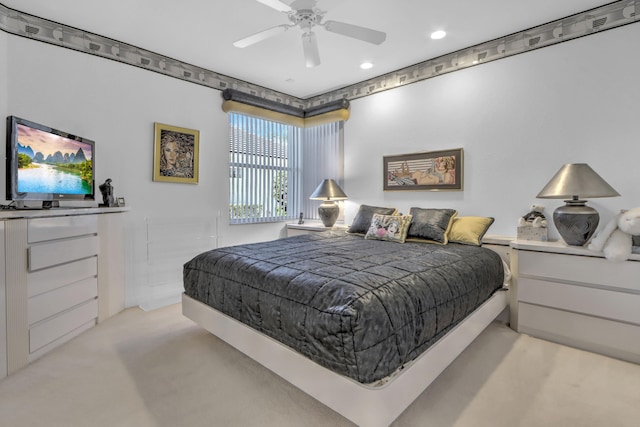 carpeted bedroom featuring recessed lighting and a ceiling fan