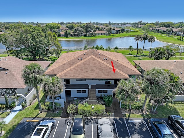 aerial view featuring a water view and a residential view