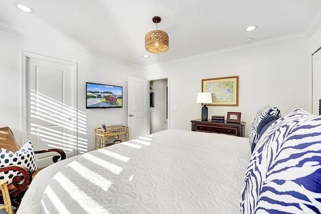 bedroom featuring ornamental molding and recessed lighting