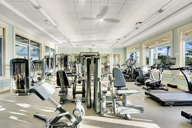 workout area with visible vents and baseboards