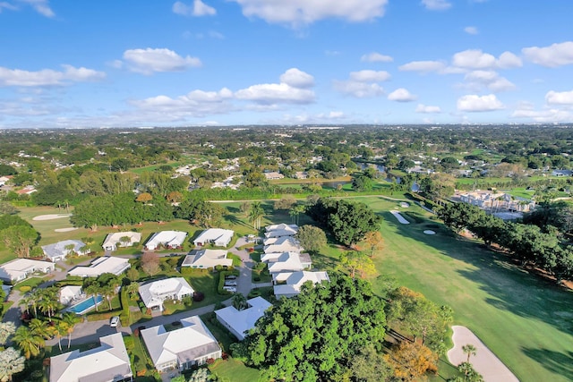 drone / aerial view with a residential view and view of golf course