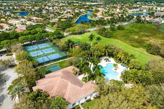 bird's eye view with a residential view and a water view