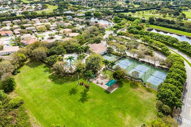 birds eye view of property with a residential view and a water view