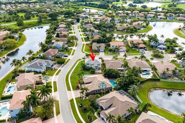 aerial view featuring a residential view and a water view