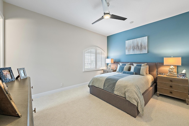 bedroom featuring carpet floors, ceiling fan, and baseboards