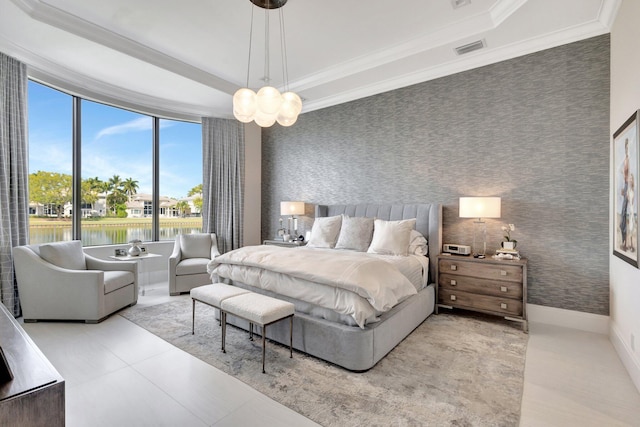 bedroom with a raised ceiling, visible vents, ornamental molding, baseboards, and wallpapered walls