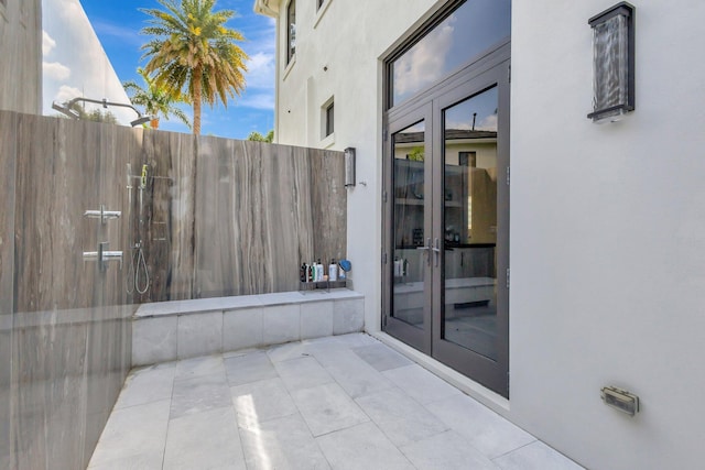 view of patio with fence and french doors