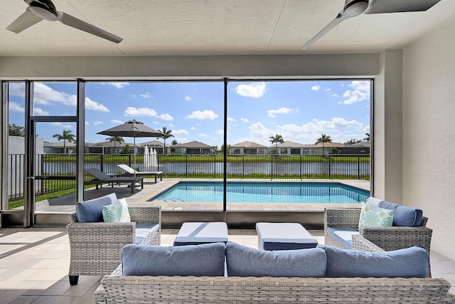 view of pool with ceiling fan