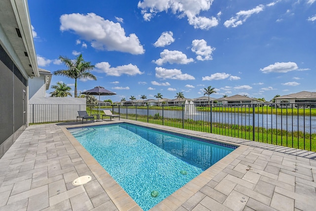 view of swimming pool with a water view, a patio area, a fenced backyard, and a fenced in pool