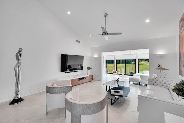 living room featuring high vaulted ceiling, light tile patterned flooring, a ceiling fan, and baseboards