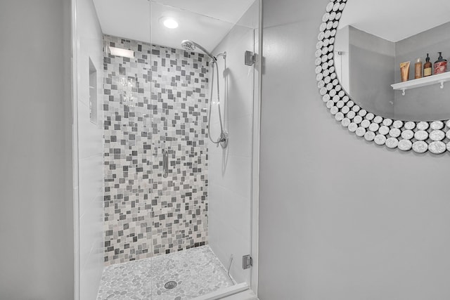 full bathroom featuring a shower stall