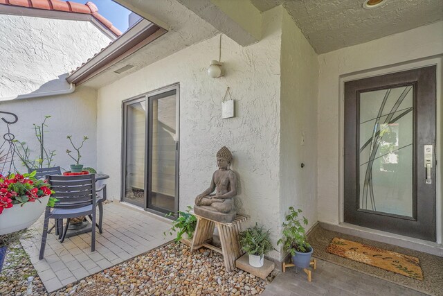 view of patio / terrace with outdoor dining space and fence