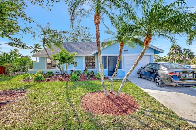 single story home with concrete driveway, a front lawn, an attached garage, and stucco siding