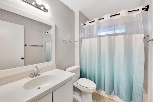 full bath featuring tile patterned flooring, shower / bath combo, vanity, and toilet