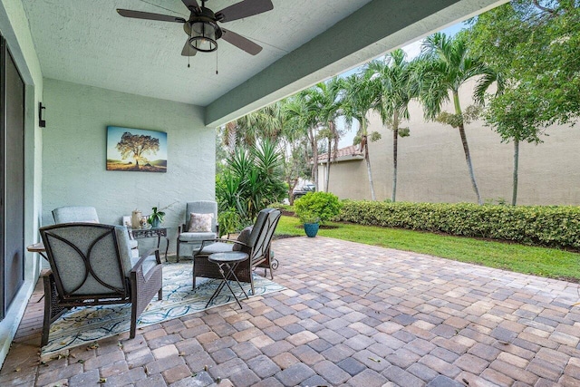 view of patio / terrace with a ceiling fan