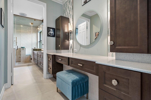 full bathroom featuring walk in shower, crown molding, and vanity