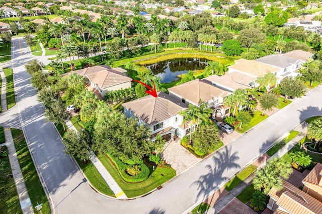 aerial view featuring a residential view and a water view