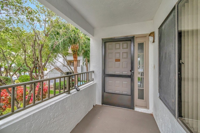 doorway to property with a balcony