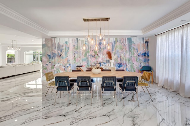 dining area featuring marble finish floor, ornamental molding, a raised ceiling, and a notable chandelier