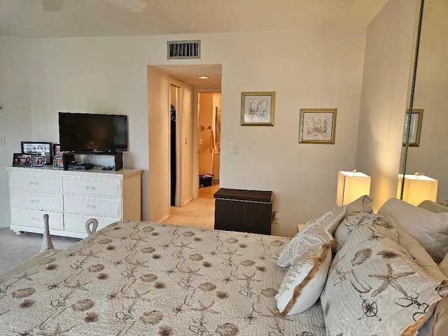 carpeted bedroom with visible vents