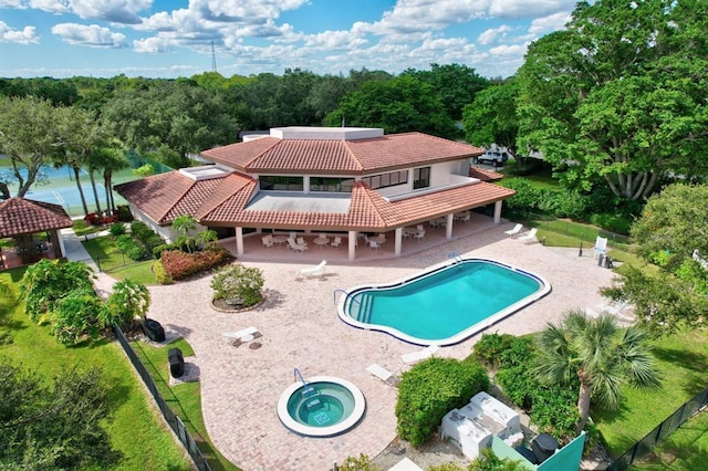 view of swimming pool with a fenced backyard, a community hot tub, a gazebo, a fenced in pool, and a patio area