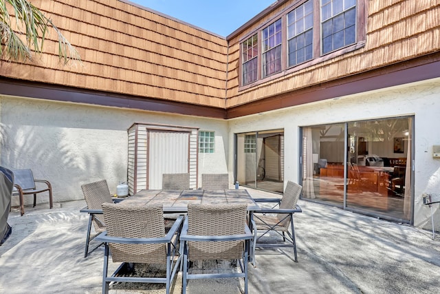 154 Weybridge Cir Unit C, Royal Palm Beach, FL 33411 - view of patio / terrace with outdoor dining space