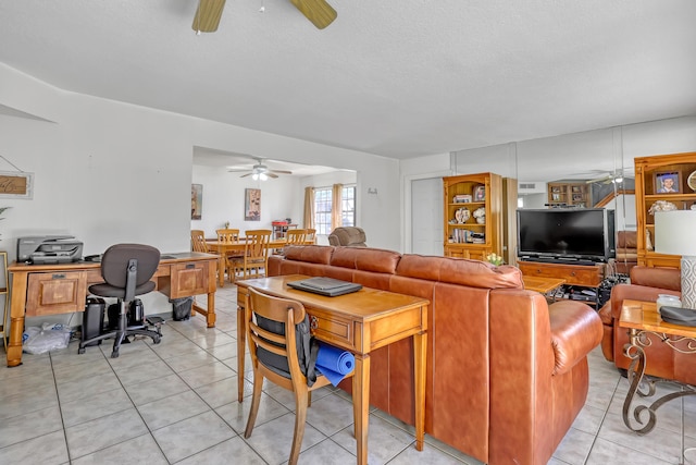 154 Weybridge Cir Unit C, Royal Palm Beach, FL 33411 - living area featuring a textured ceiling, light tile patterned floors, and a ceiling fan