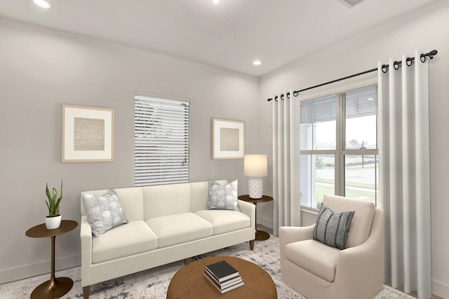 living room featuring recessed lighting and baseboards