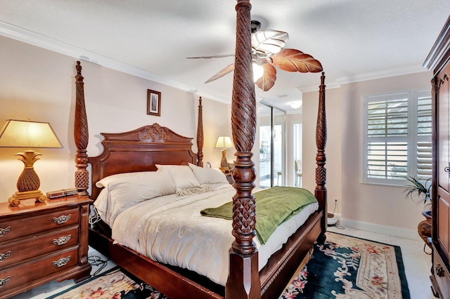 bedroom with light tile patterned floors, baseboards, ornamental molding, and ceiling fan