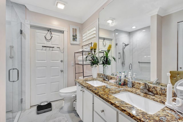 bathroom with crown molding, a sink, a shower stall, and toilet