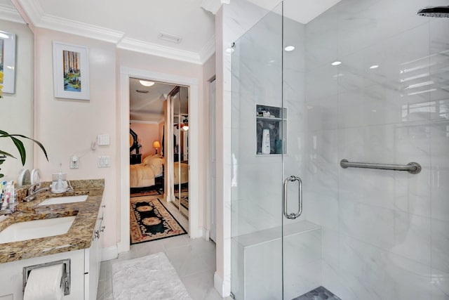 full bathroom with double vanity, a stall shower, visible vents, connected bathroom, and ornamental molding