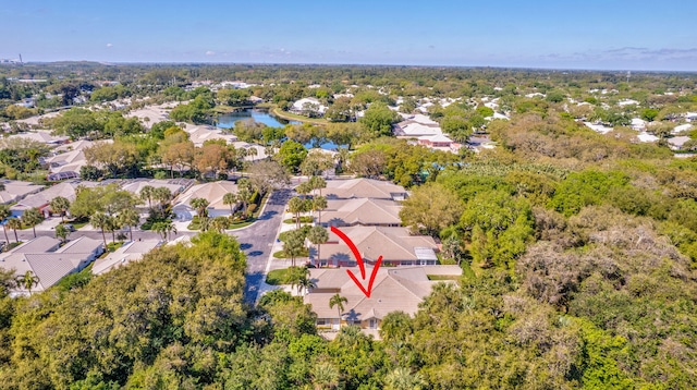 bird's eye view featuring a water view and a residential view