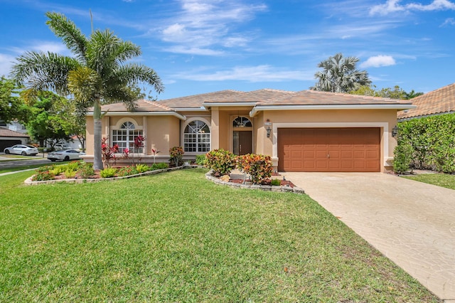 ranch-style home featuring a garage, driveway, a front lawn, and stucco siding